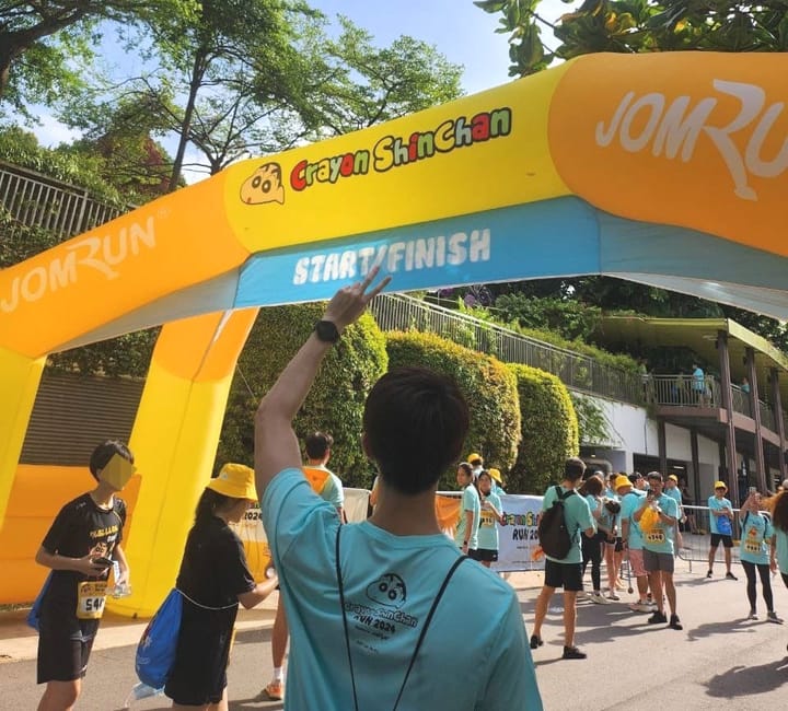 Posing after crossing the 4km finish line at Shinchan Run!